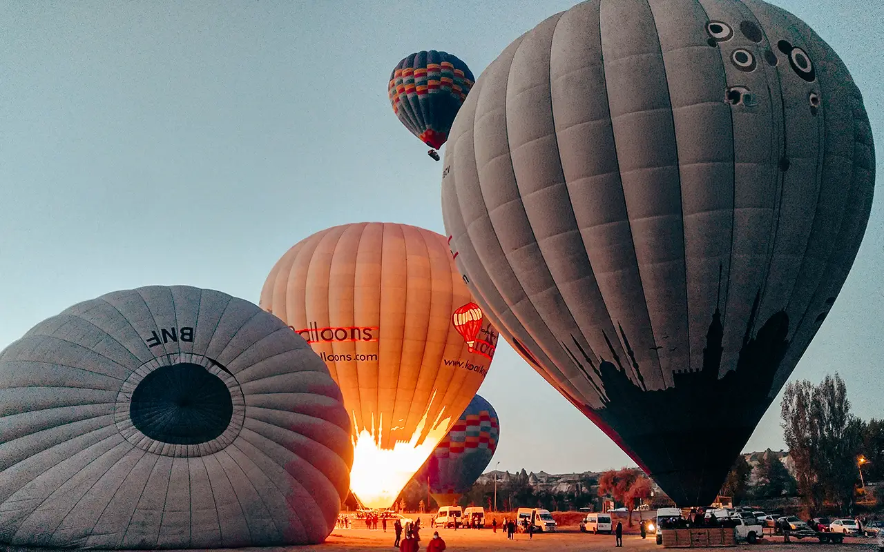 Daily update graphic for the Cappadocia Balloon Flight Status, featuring hot air balloons floating over the valley at dawn.