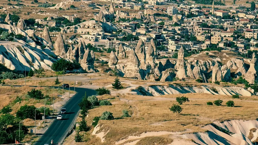Road leading into Göreme past fairy chimneys in central Cappadocia